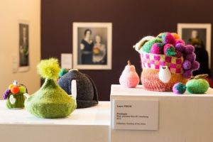 The Queen of the Tea Cosies has a knitted objets d'art exhibition